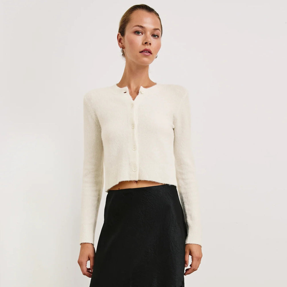 A woman wearing the Ivory Matilda Sweater from Rails