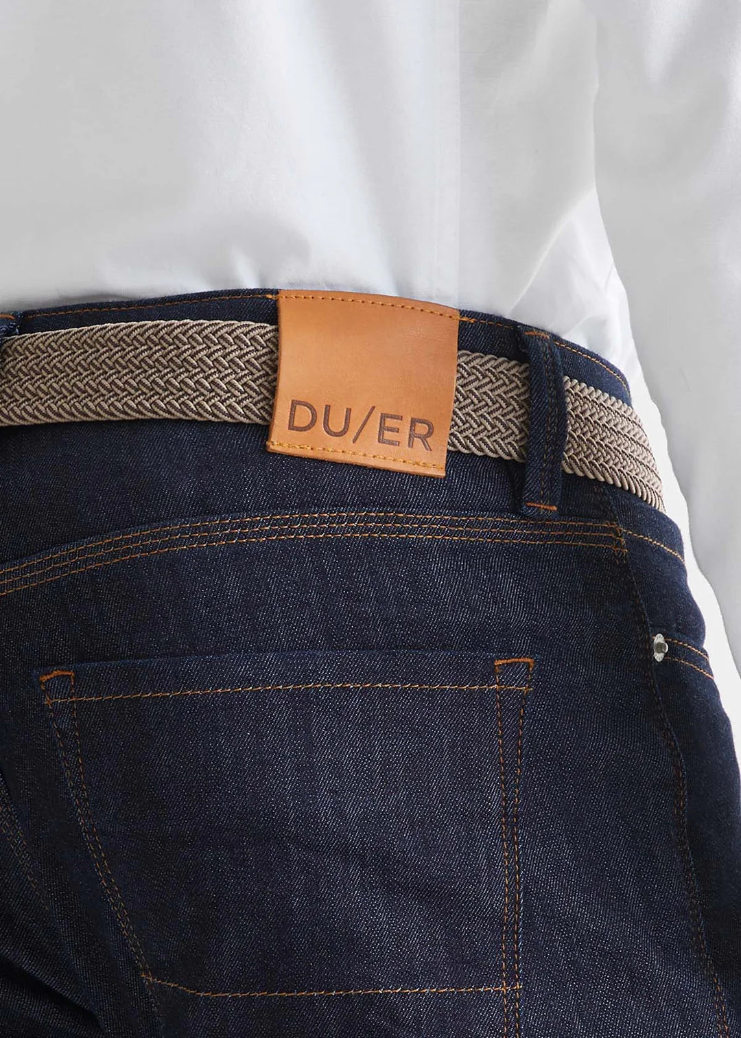 Back view of the Performance Stretch Belt in beige and brown by DU/ER