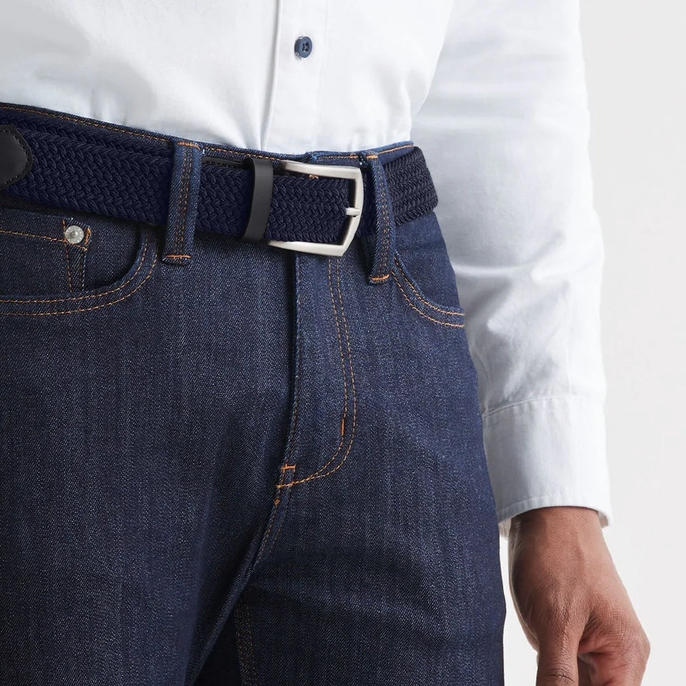 
                      
                        Front detail on the Navy and Black Performance Stretch Belt by DU/ER
                      
                    