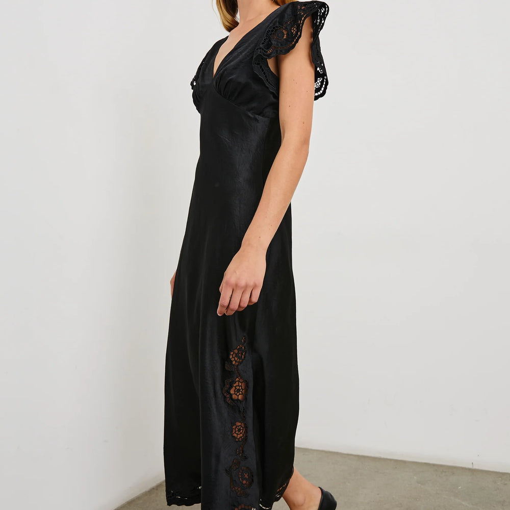 
                      
                        Side view of the Black Eyelet McKenna Satin Midi Dress by the brand Rails
                      
                    