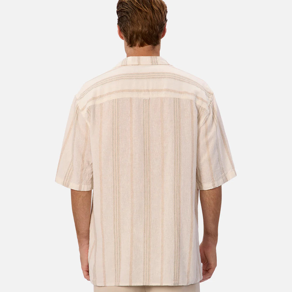 
                      
                        Man wearing a beige striped shirt on a white background
                      
                    