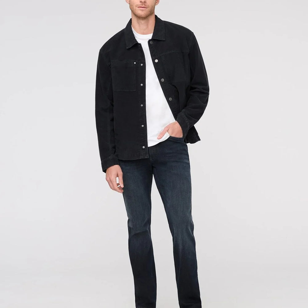 The DUER Slim Straight Performance Denim men's jeans have a slim fit through the hip and thigh and are straight from the knee down.