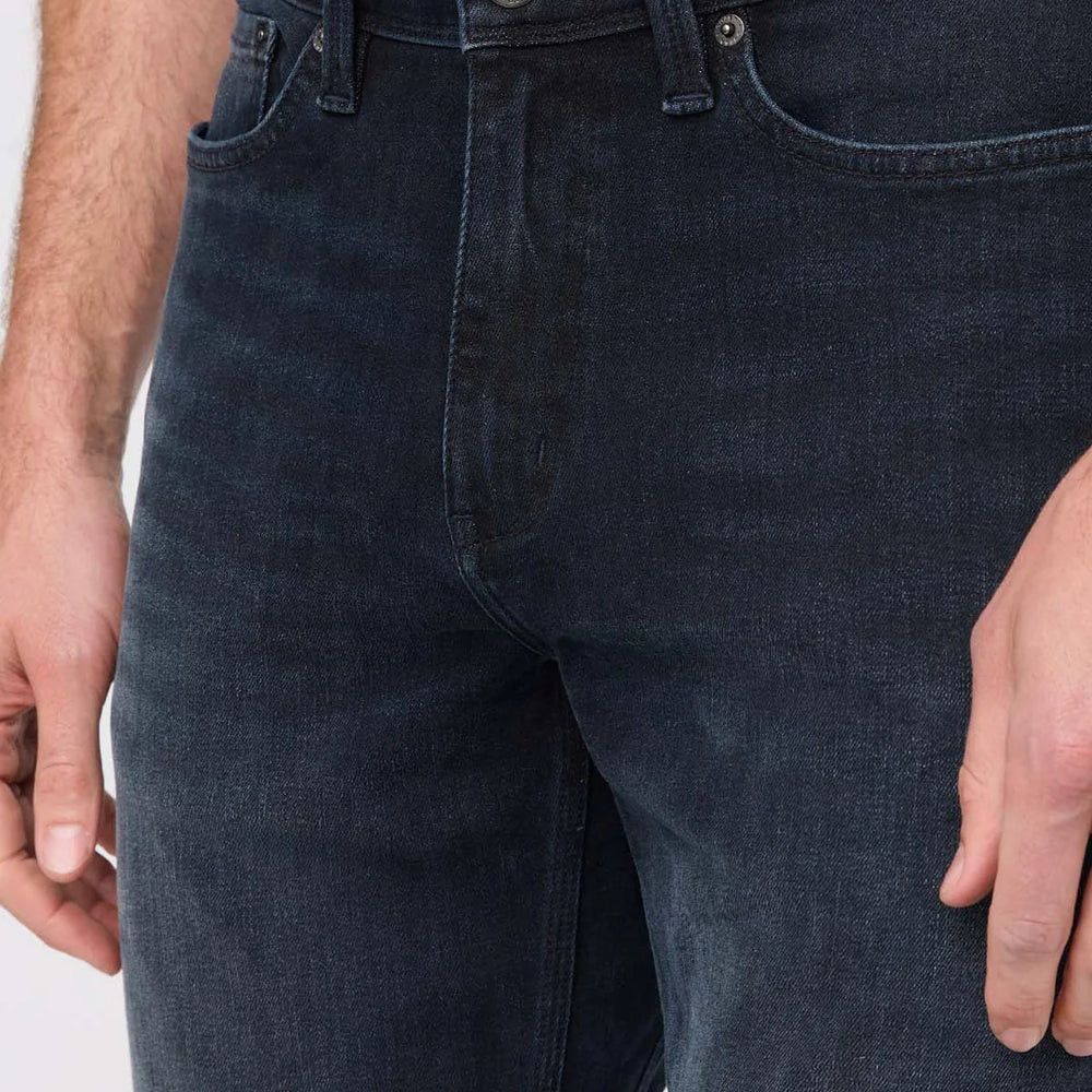 
                      
                        Dark wash men's jeans from DUER
                      
                    