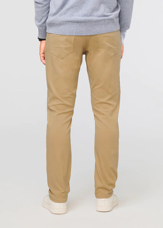 Back view of DUER's NuStretch Relaxed 5-Pocket Pant in the color Khaki