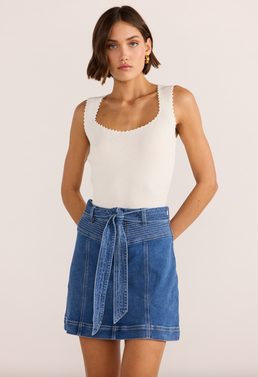 Find the Ellis Denim Panel Mini Skirt by MINKPINK at Harbour Thread for fresh spring style. 