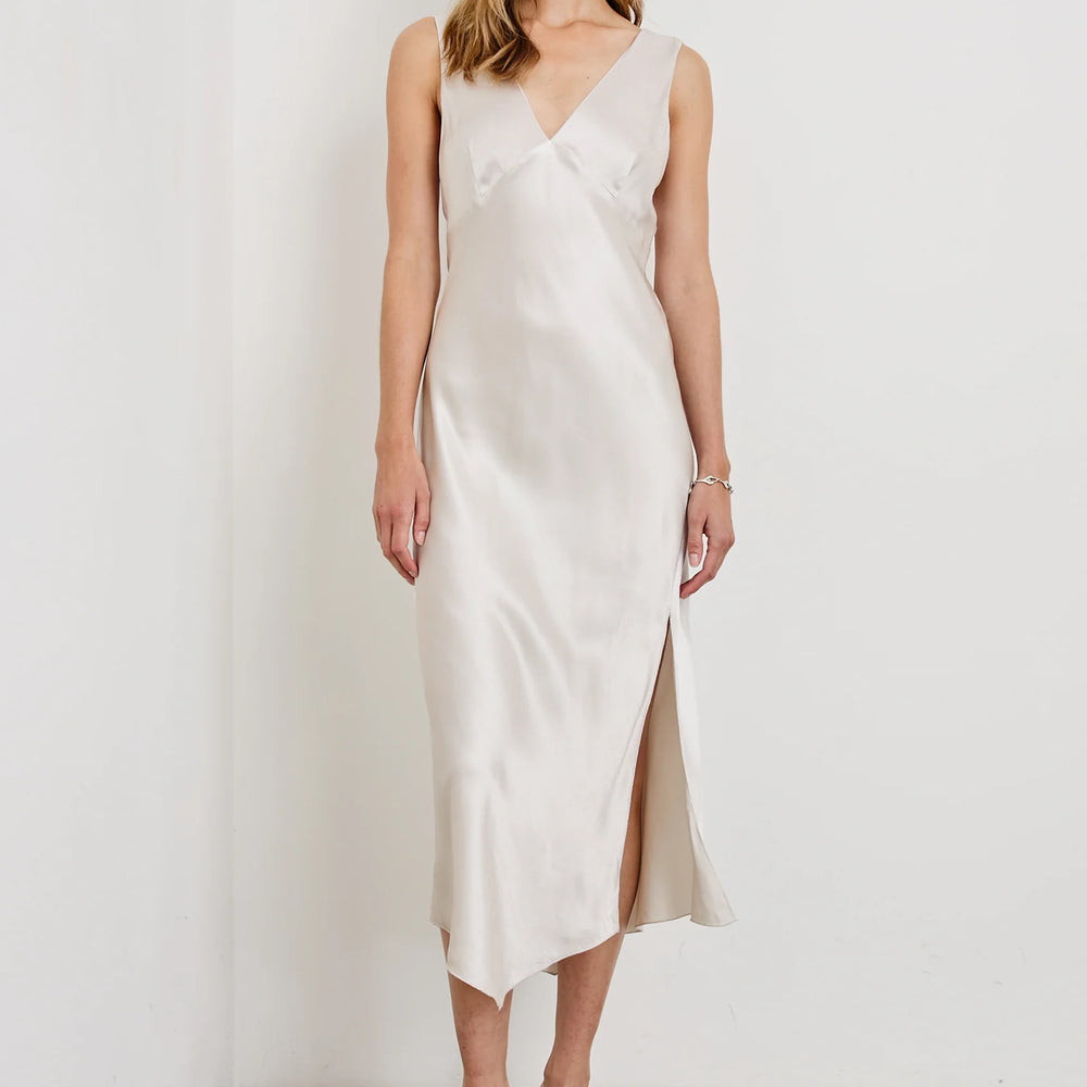 
                      
                        A woman wearing the Ivory Monique Midi Slip Dress by Rails
                      
                    