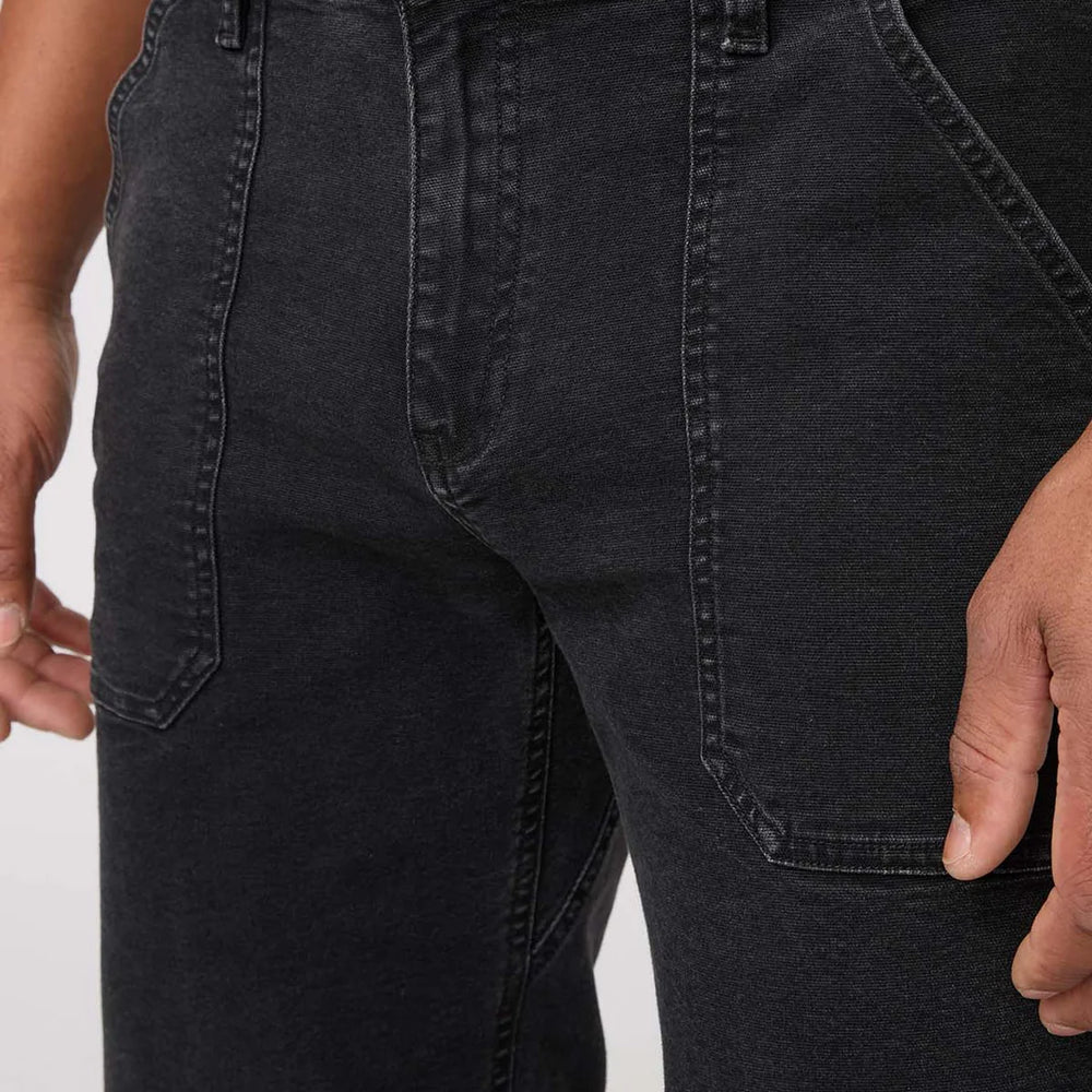 
                      
                        Men's black utility jeans from DUER
                      
                    