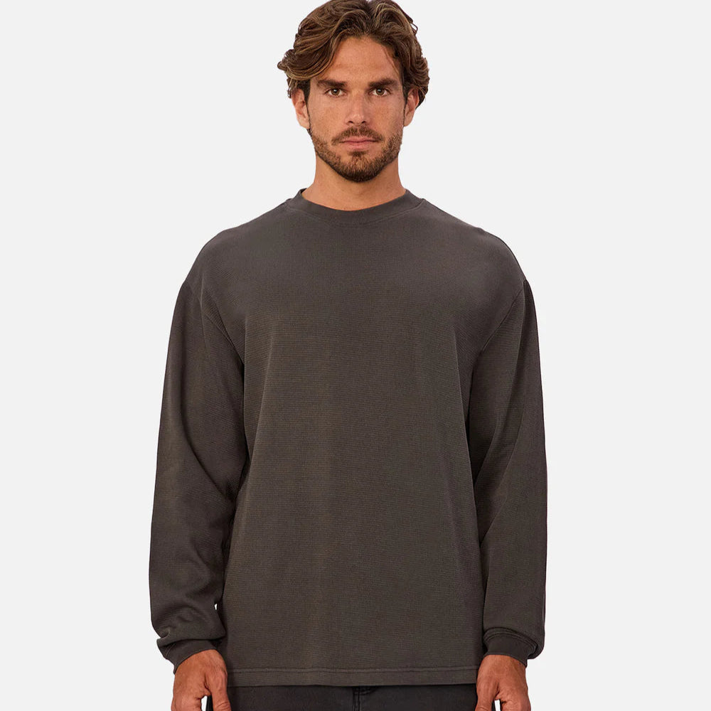 
                      
                        A man wearing a dark grey long sleeve shirt from Industrie
                      
                    