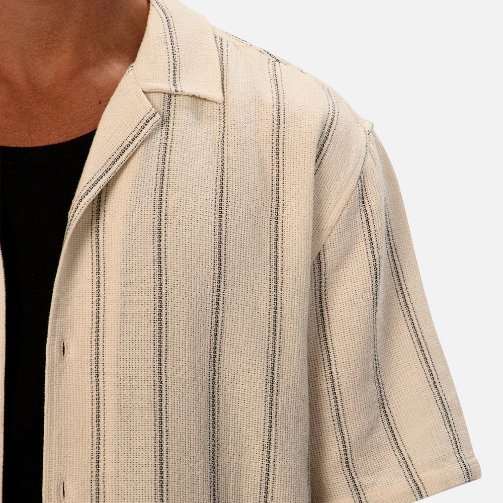 The Industrie Calabria Short Sleeve Shirt is a perfect way to elevate your style at casual gatherings this summer. Shop it at Harbour Thread!