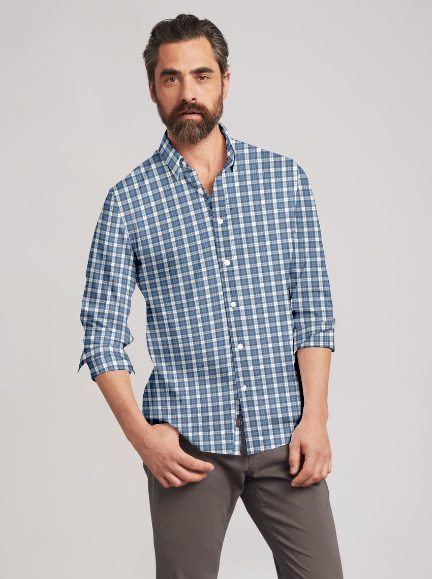 Front view of a man wearing the easide Blue Plaid Movement Shirt by Faherty