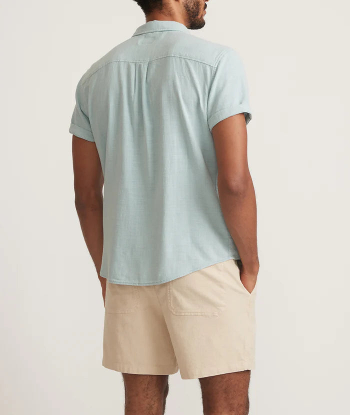 
                      
                        Back view of the Marine Layer Men's Stretch Selvage Short Sleeve Shirt in the color Pale Blue
                      
                    