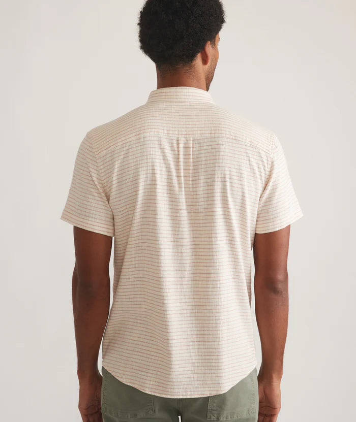 
                      
                        Back view of the Marine Layer Men's Stretch Selvage Short Sleeve Shirt in the color Warm Stripe
                      
                    