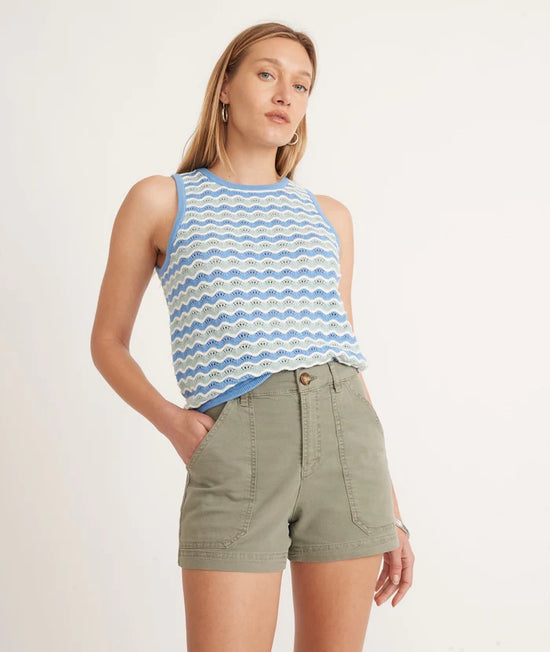 Woman wearing Marine Layer's Maya Utility Short in the color Olive
