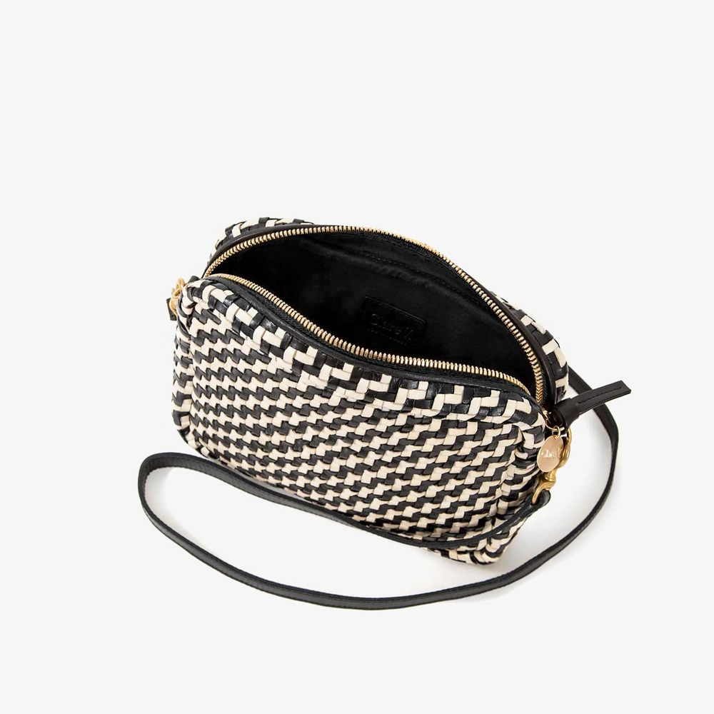 
                      
                        black and white woven purse
                      
                    