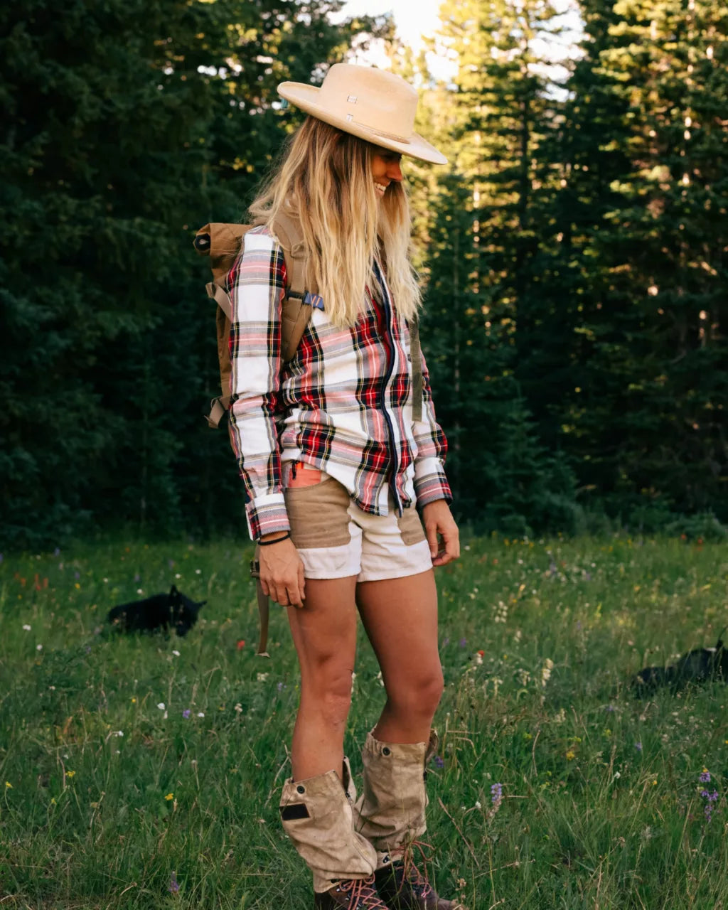 Woman outside wearing the Offwhite and Tan or 5Incher Women's Field Shorts by Amundsen Sports