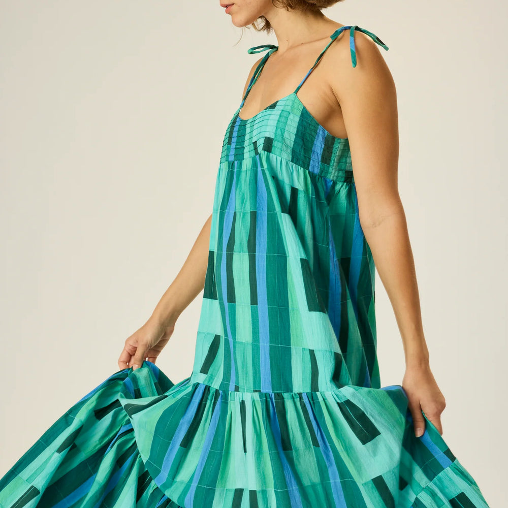 
                      
                        Enjoy the sweetness of summer style with the Melanie Tie Strap Maxi Dress from Natalie Martin, available to shop at Harbour Thread
                      
                    