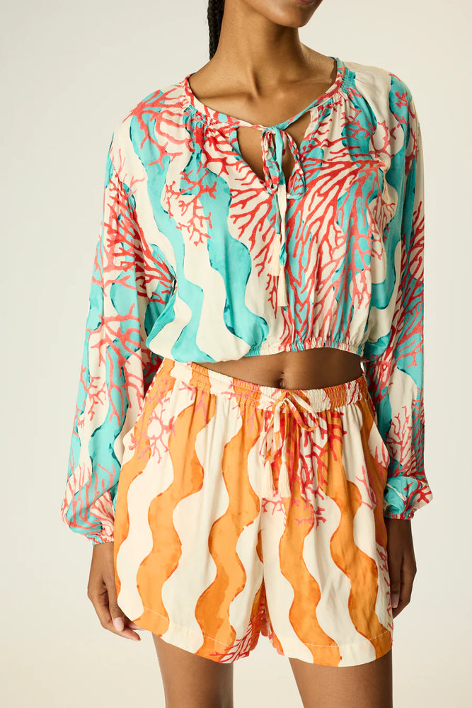 
                      
                        The Natalie Martin Jasper Short in the color Coral Wave Honey
                      
                    