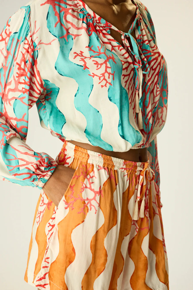 
                      
                        Find resort resort-ready at Harbour Thread women's boutique with the Coral Wave Honey Jasper Shorts by Natalie Martin
                      
                    