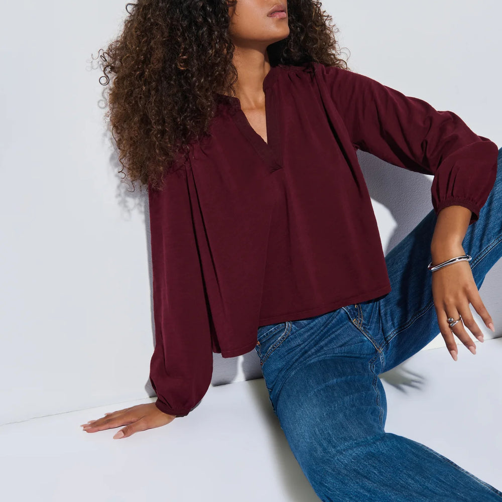 The Maya V-Neck Top features long blouson sleeves