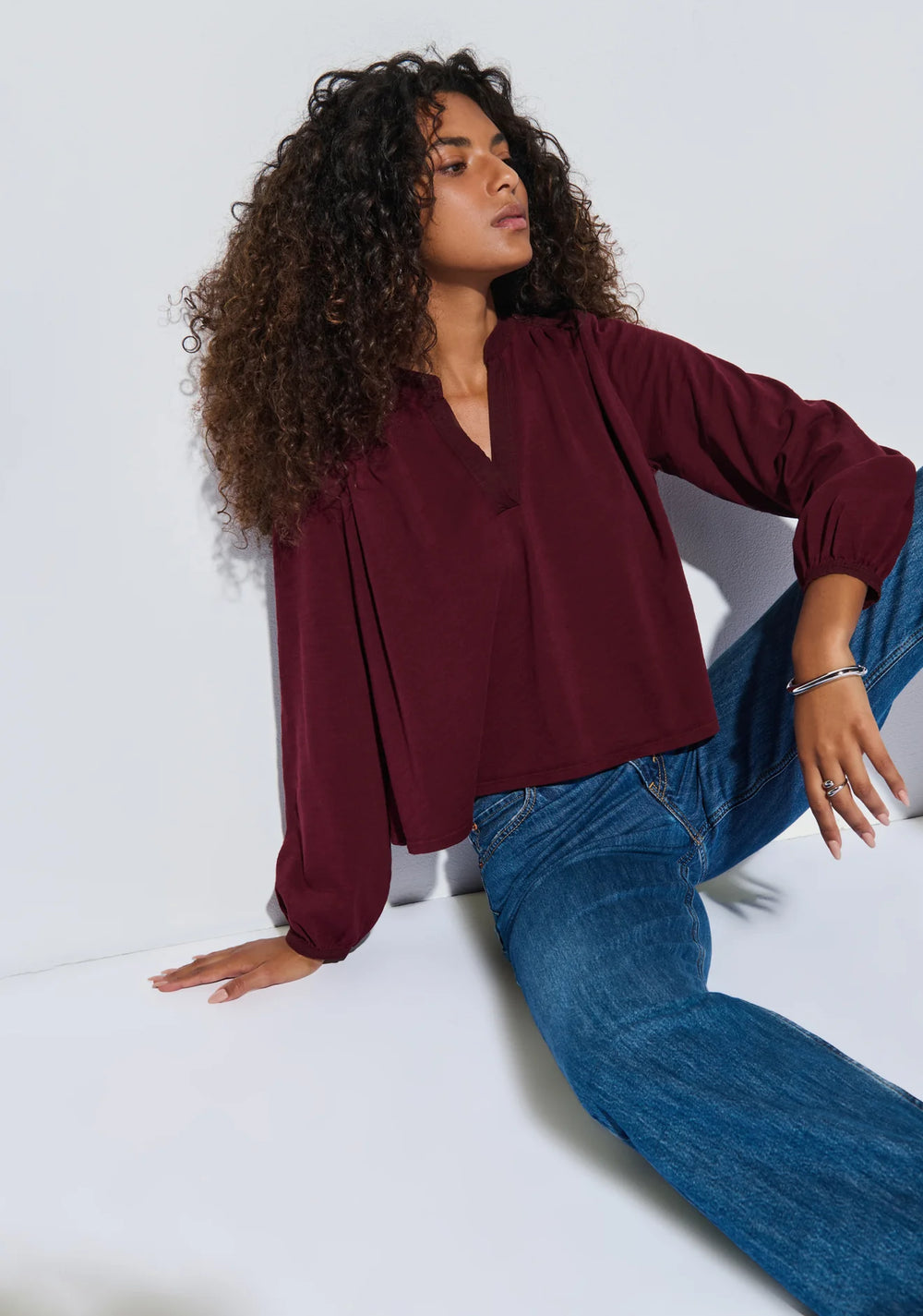 The Maya V-Neck Top features long blouson sleeves