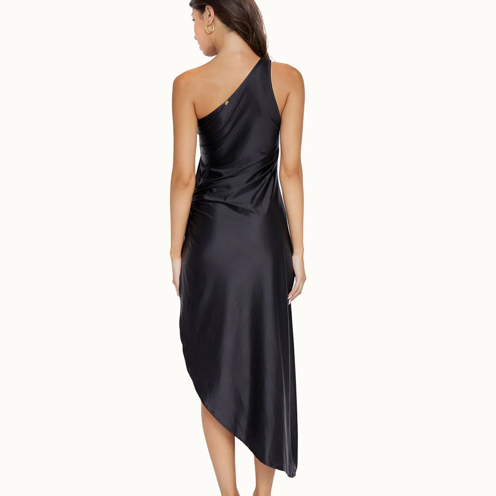 
                      
                        Back view of the PQ Swim's Tinsley Ring Dress in the color Nightfall
                      
                    