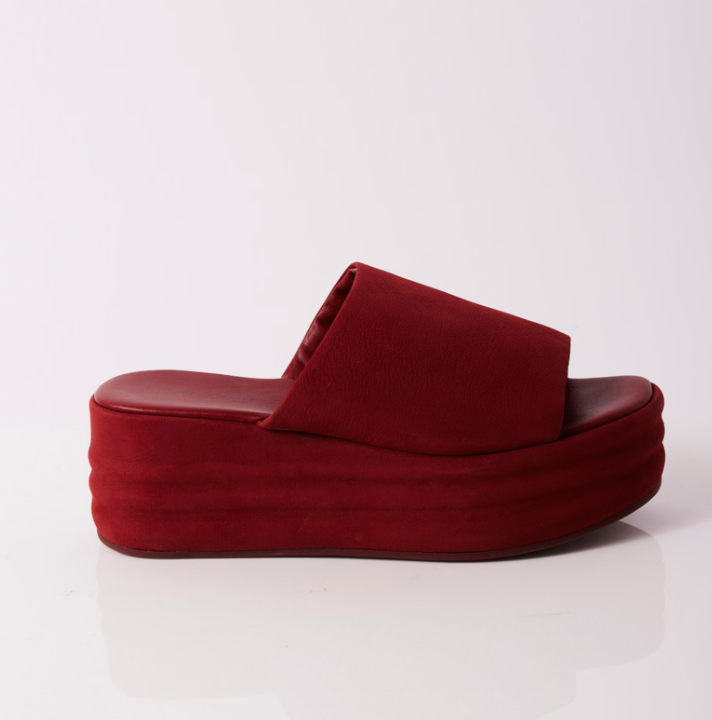 
                      
                        Women's red platform slide sandals by Free People
                      
                    