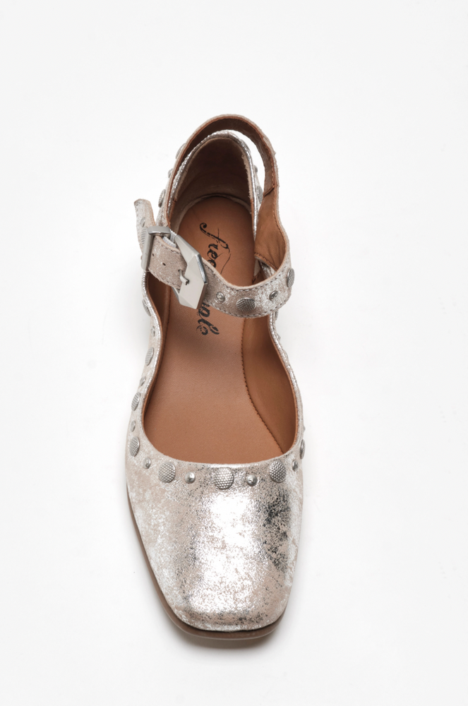 
                      
                        Free People flats with an ankle strap and rounded toe
                      
                    