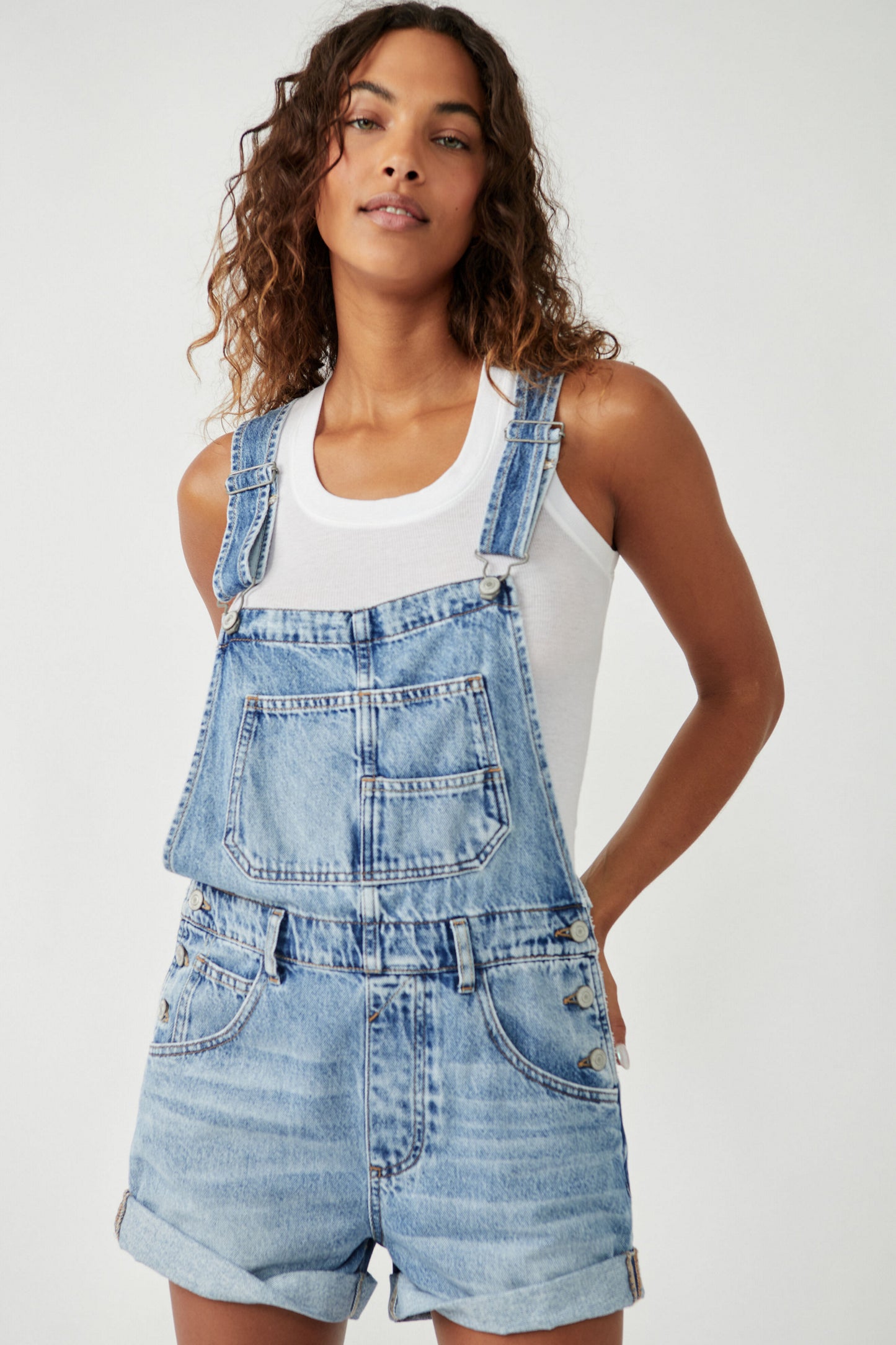 Front view of the Free People Ziggy Shortall in medium wash denim color