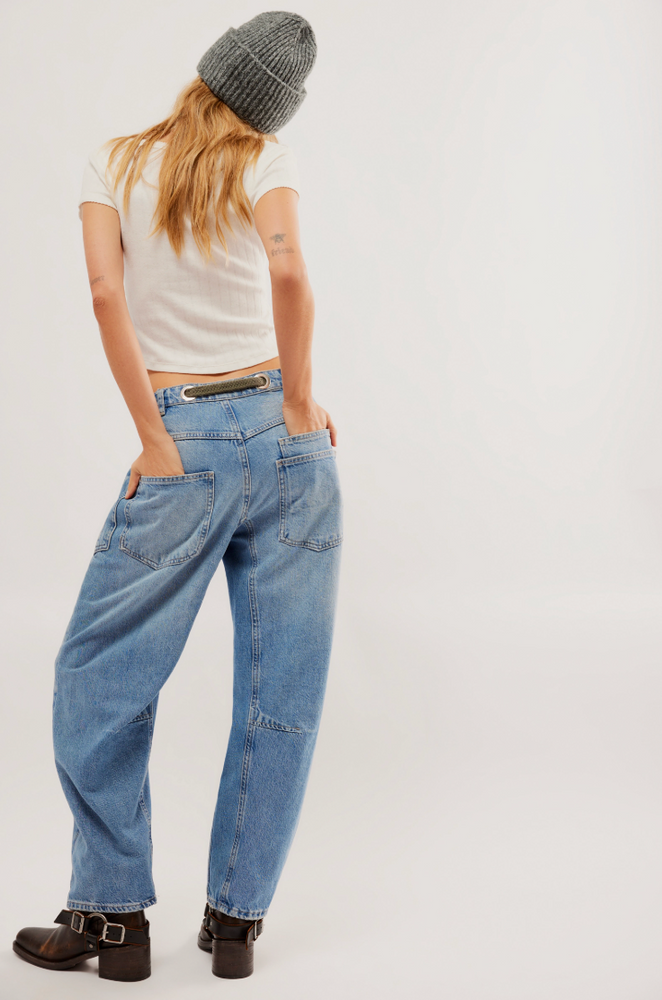 
                      
                        Free People's Moxie Low Slung Pull-On Barrel Jeans in the color Truest Blue
                      
                    