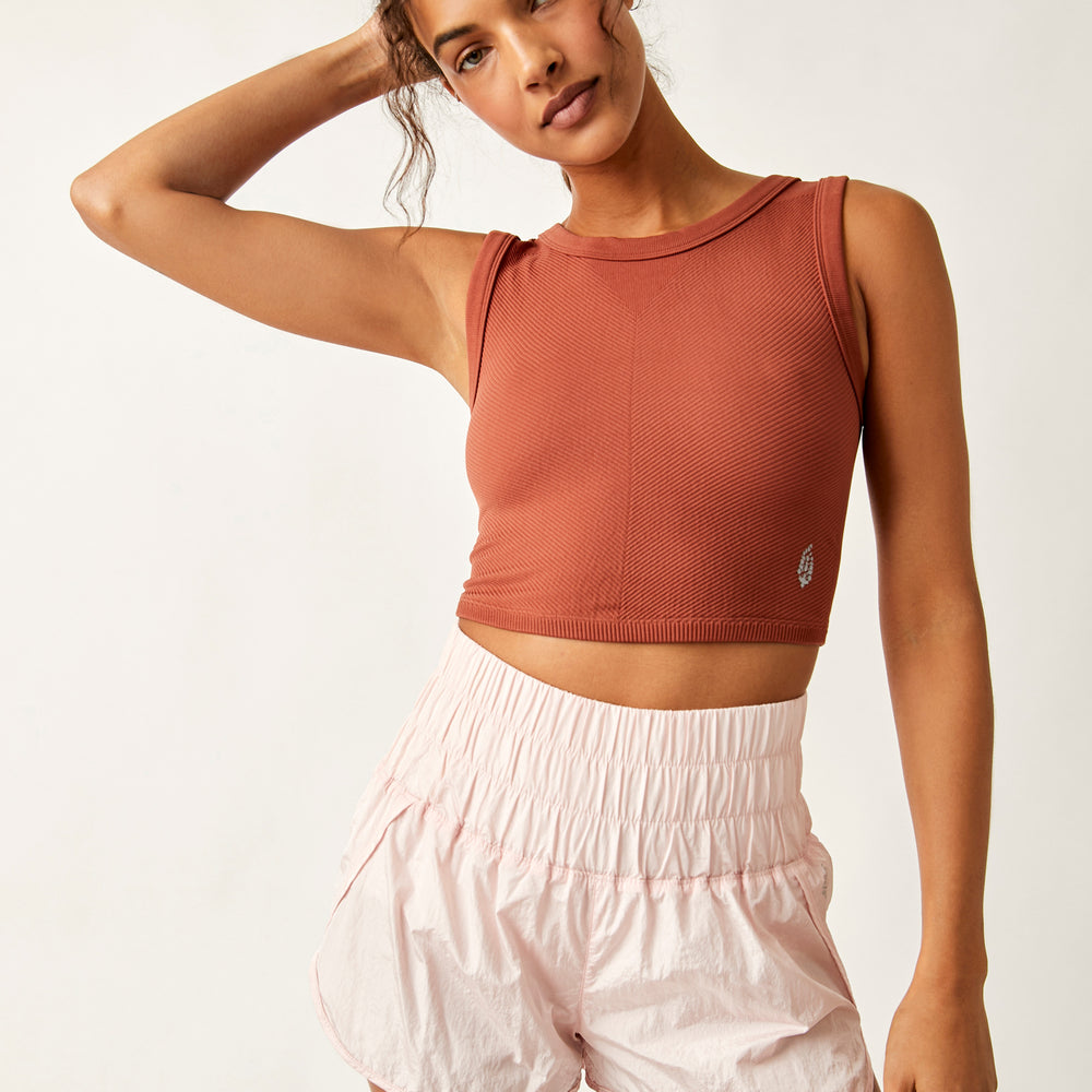Front view of the Free People Free Throw Muscle Tank in the color Sequoia