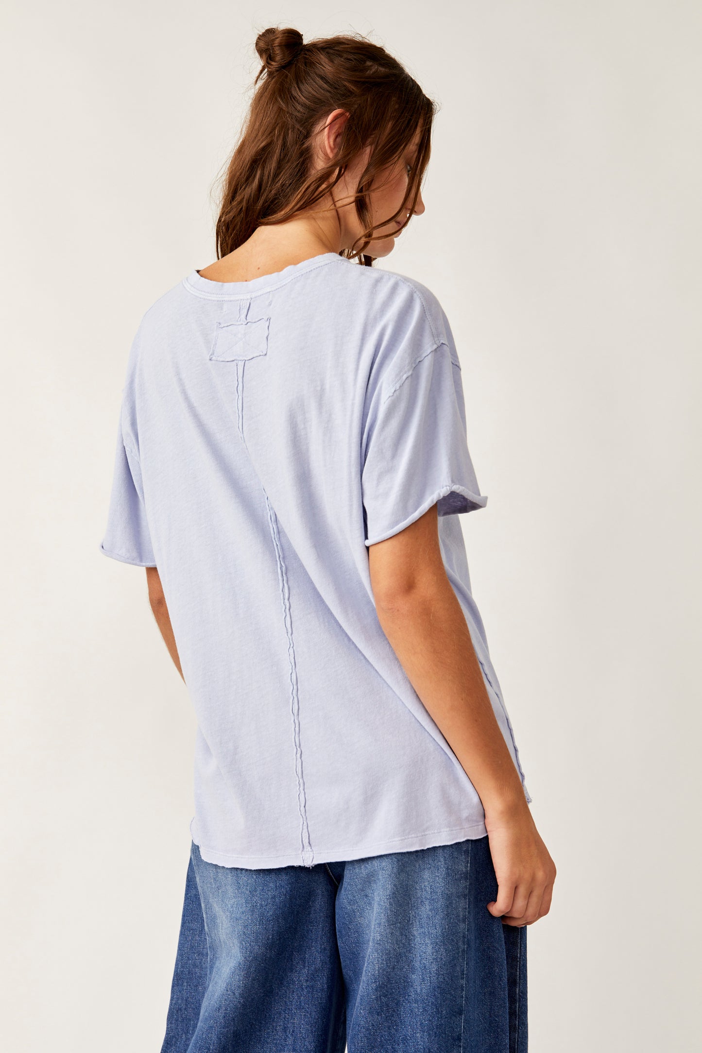Back view of the oversized Free People Nina Tee in the color Chambray Sky