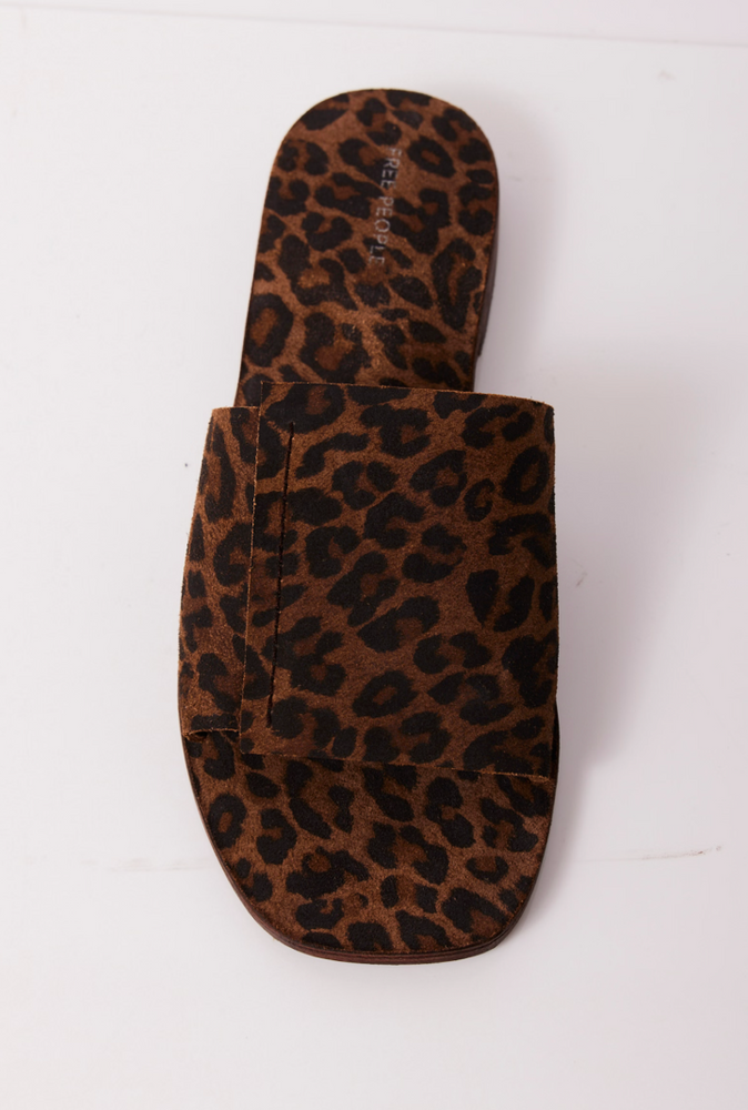 
                      
                        Dark leopard print slide sandals from Free People
                      
                    