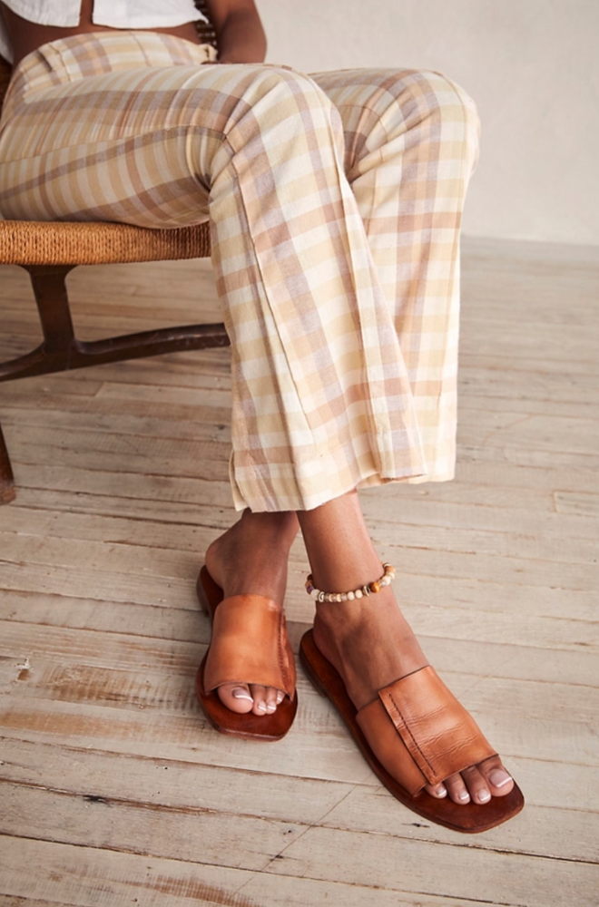 
                      
                        Elevate any outfit this summer with Free People's Verona Slide Sandal. 
                      
                    