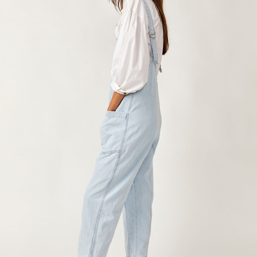 
                      
                        Side  view of the light wash Free People High Roller Jumpsuit
                      
                    