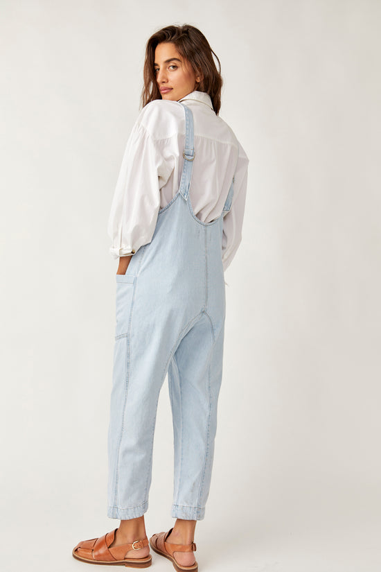 Back  view of the light wash Free People High Roller Jumpsuit