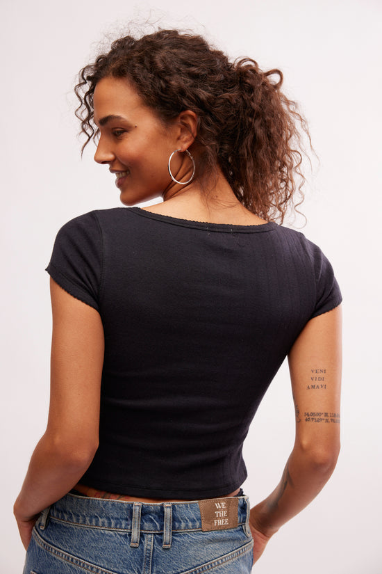 Back view of the Free People End Game Pointelle Baby Tee in the color Black