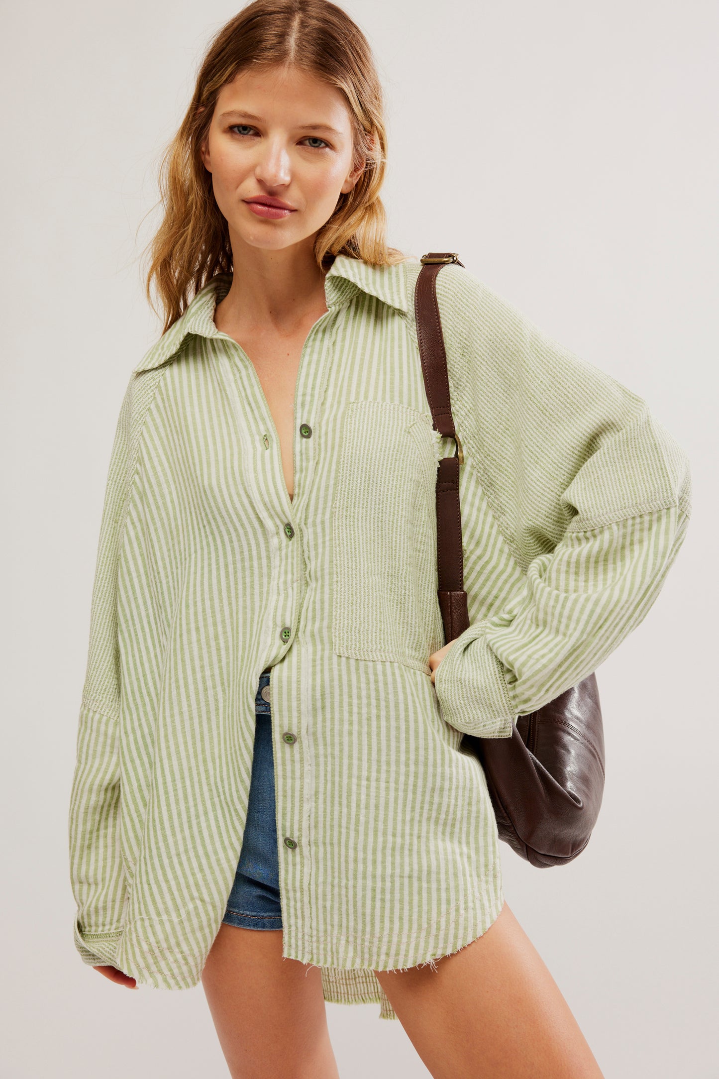 Front view of the Free People Indigo Skies Striped Shirt in the color Sage Combo