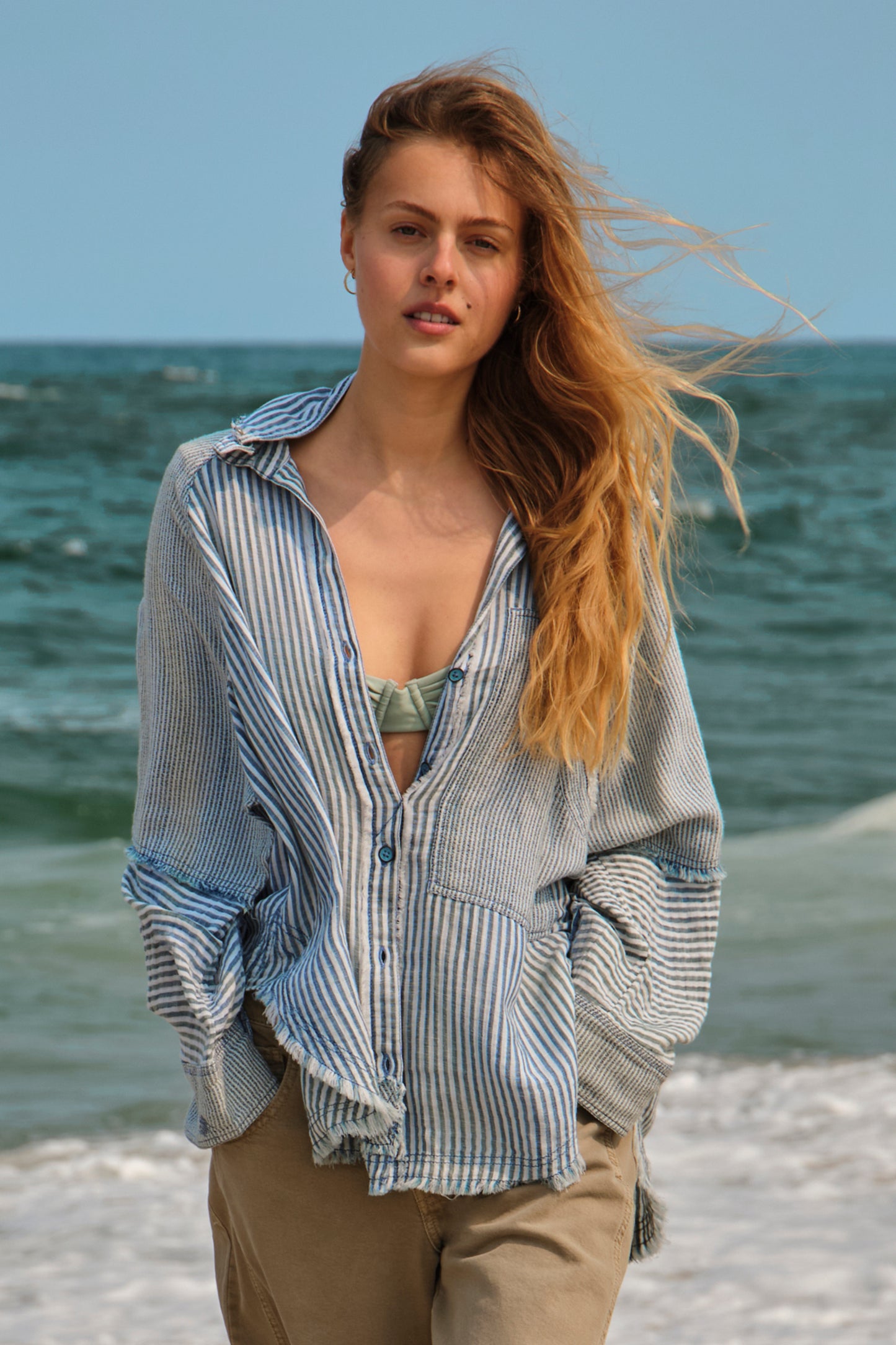 Front view of the Free People Indigo Skies Striped Shirt in the color Indigo Stripe Combo