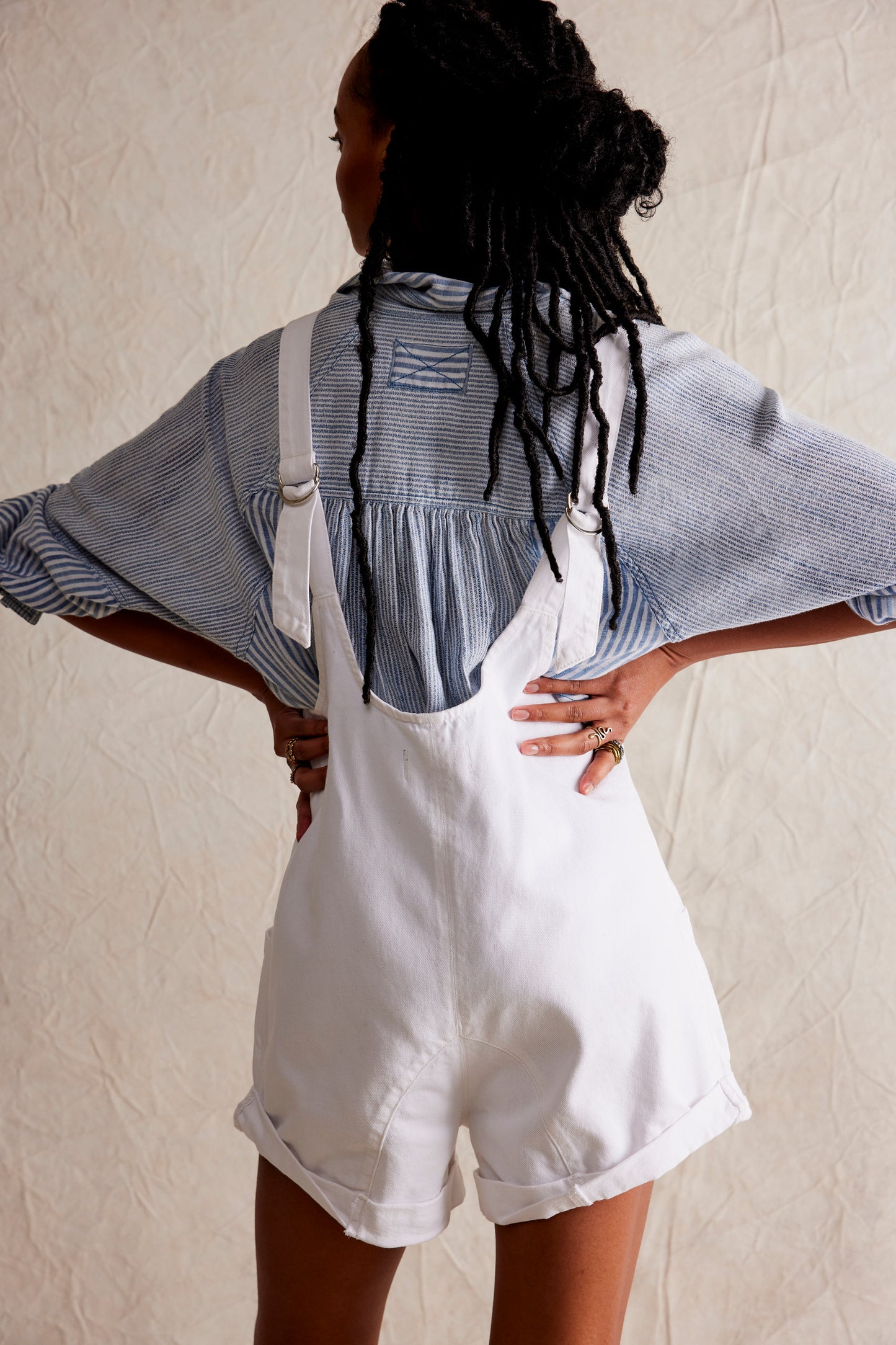 Back view of the Free People High Roller Shortall in the color Optic White