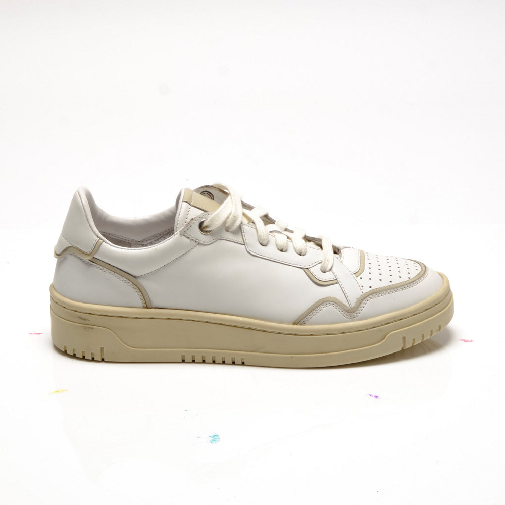 
                      
                        Profile side view of The Free People Thirty Love Court Sneaker in the colors White and Natural
                      
                    