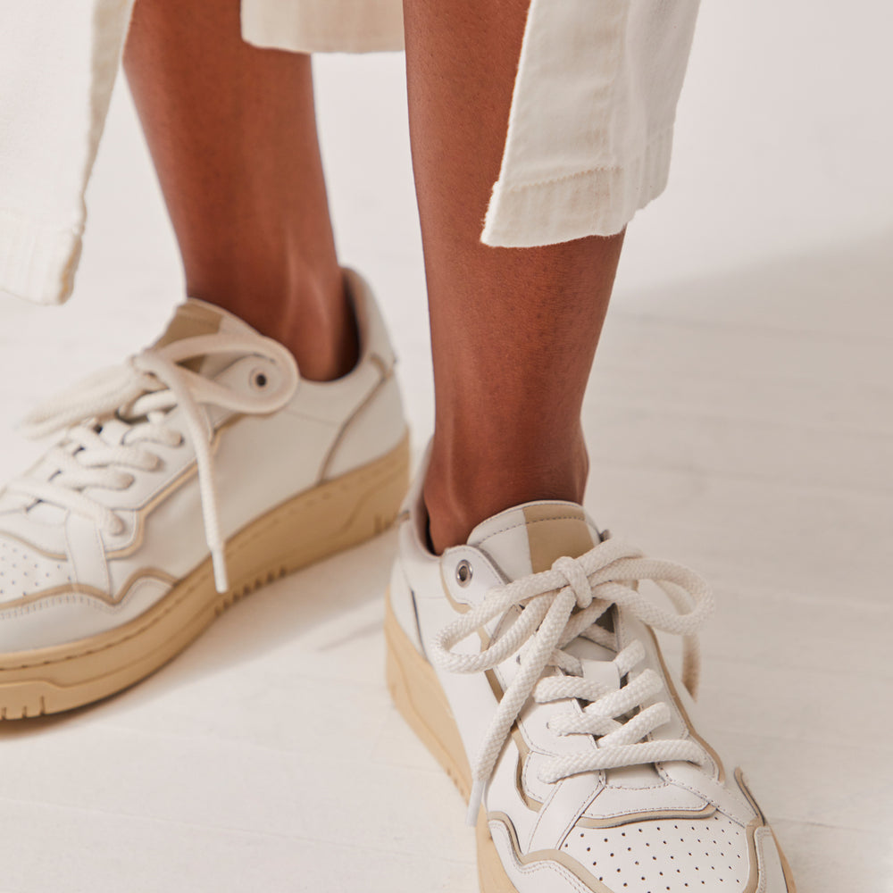 
                      
                        The Free People Thirty Love Court Sneaker in the colors White and Natural
                      
                    