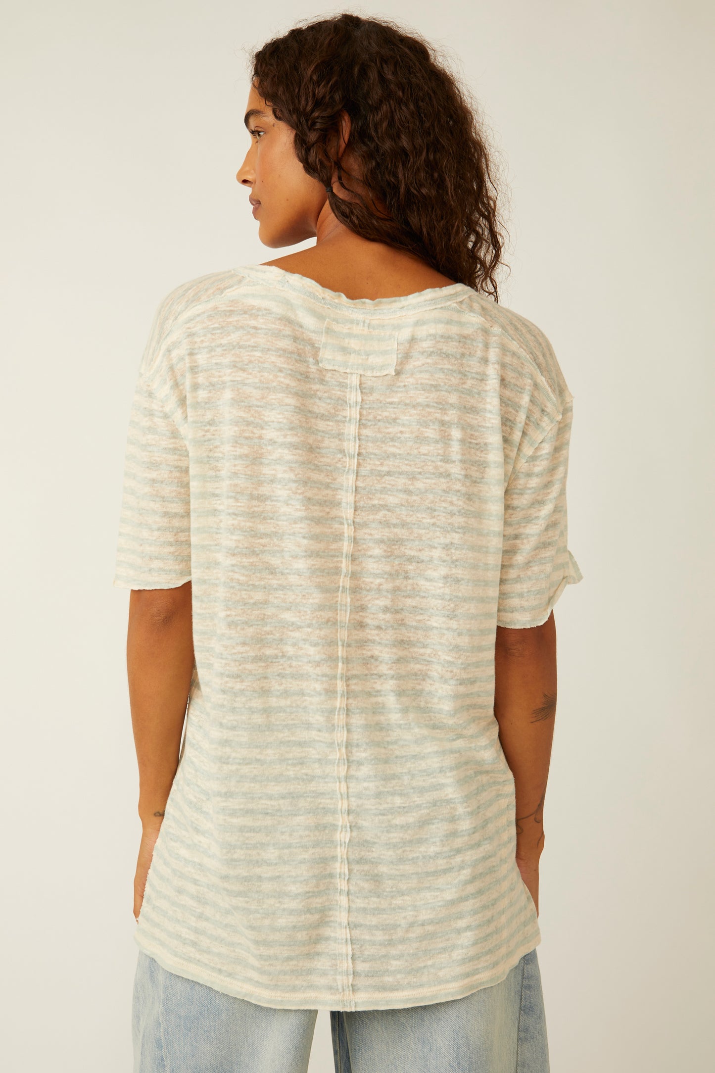 Back view of the Free People All I Need Stripe Tee in the color Mineral Sea Combo