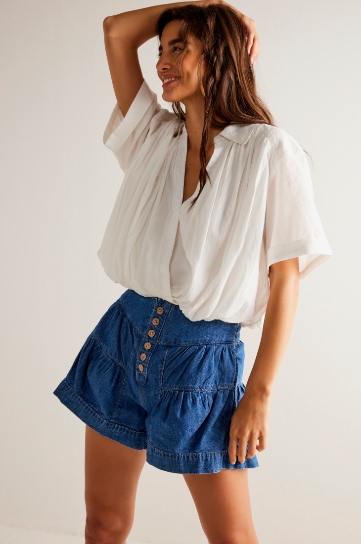 Shop the fun and flouncy button front Fleur Denim Shorts by Free People at Harbour Thread for fun spring and summer style. 