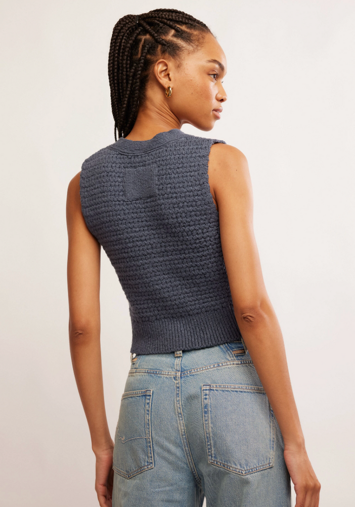 
                      
                        Women's blue, soft knit vest from Free People. 
                      
                    