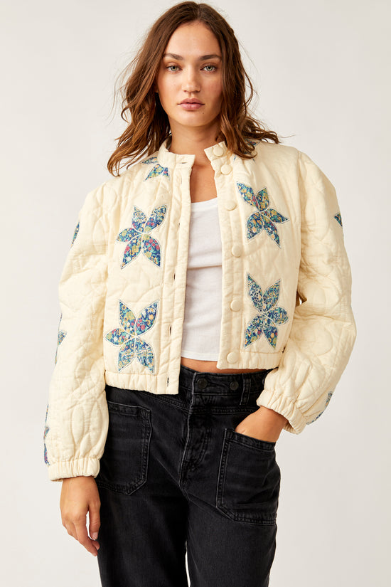 Front view of the Free People Quinn Quilted Jacket  in the color Teal Combo