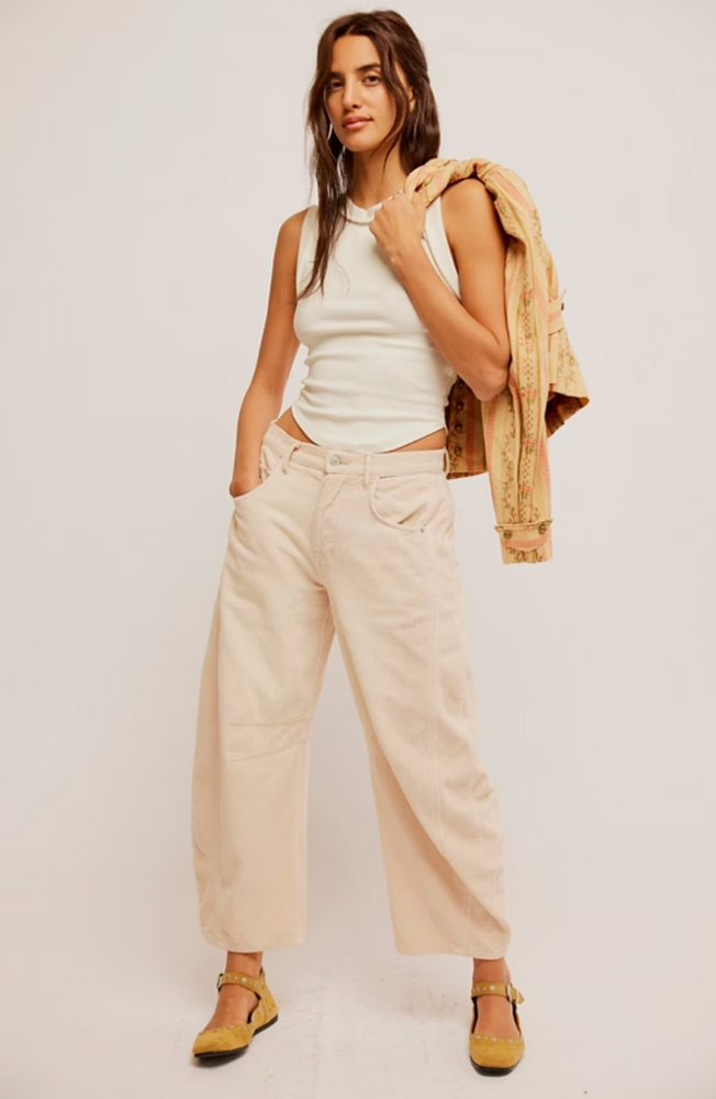 
                      
                        The Crystal Grey Mid-Rise Cord Barrel Jeans by Free People offer versatile styling options
                      
                    