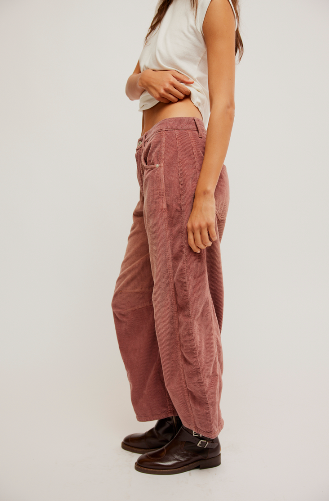 
                      
                        The Withered Rose Mid-Rise Cord Barrel Jeans by Free People offer a relaxed fit with an on-trend silhouette
                      
                    