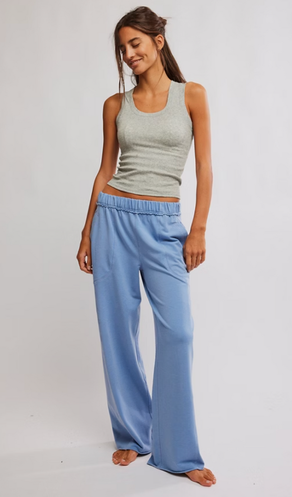 
                      
                        Women's blue wide leg sweatpants from Free People. 
                      
                    