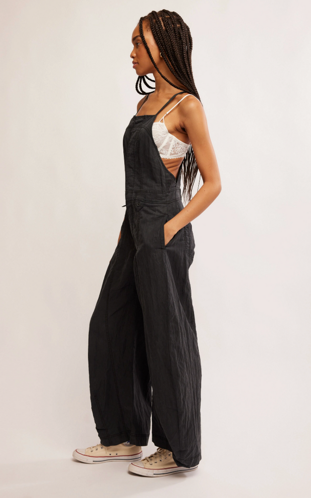 
                      
                        The Free People Sylvia Barrel One-Piece offers pocket details and a relaxed fit
                      
                    