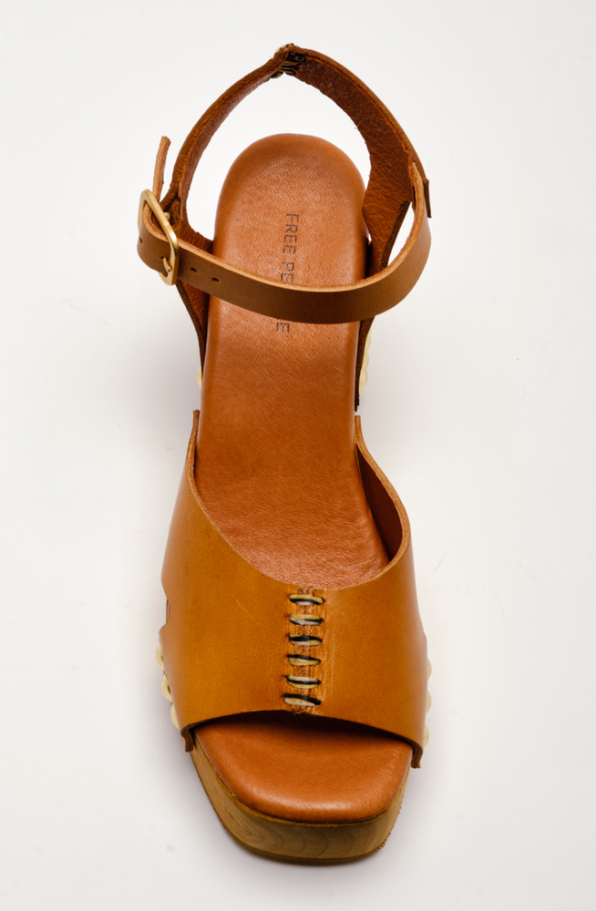 
                      
                        Women's brown leather clog sandal with seamed detail across the toe strap
                      
                    